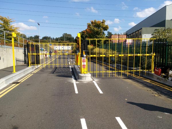 These are our secure access slowed down entry/exit 2.2M high and fencing all-round site installed 2016. The gap is only 3.7M wide.
