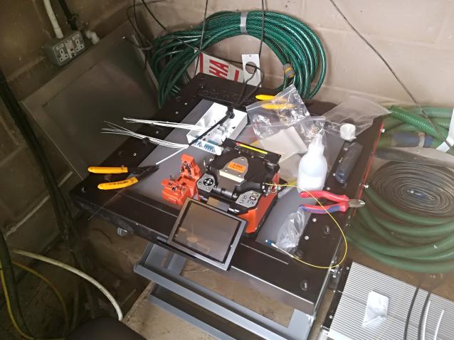 Splicing a 4 core fibre into a 16 way wall panel.