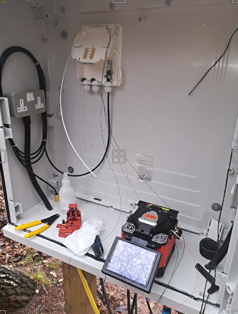Splicing a 4 core fibre into a 16 way IP65 way wall panel.