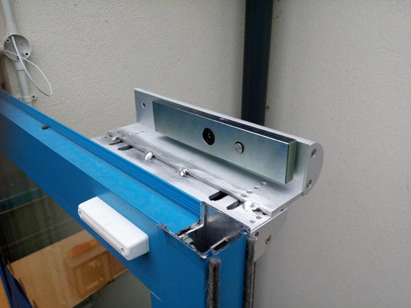 We cabled outside in conduit and TIG welded the Z bracket together as it was hanging right out, this was because the door was set deep in the wall.